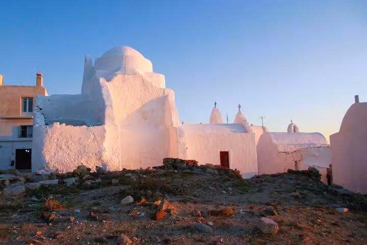 Whitewashed Mykonos church at sunset in Chora, featured on guided walking tour for cruise ship passengers