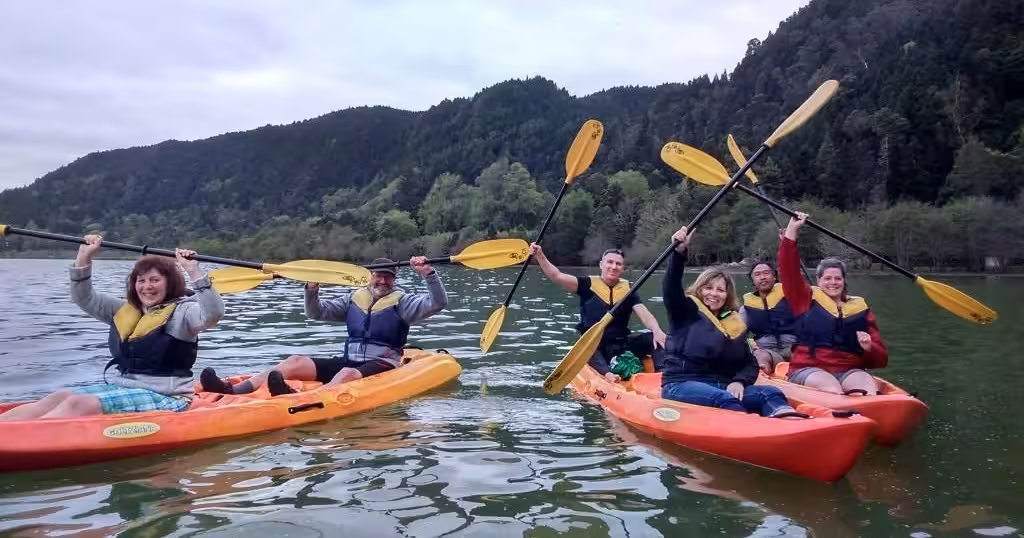 Group kayaking on Furnas Lake, São Miguel Azores, part of Mystic Furnas canoeing and bike tour adventure