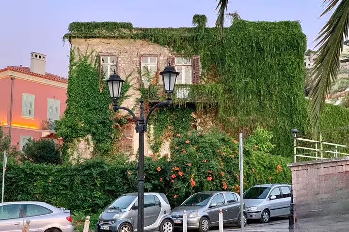 Nafplio old town ivy-covered neoclassical building, a scenic stop on a private half-day trip from Athens