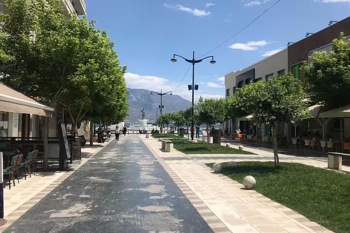Tree-lined Nafplio promenade stop on private day trip to Corinth Canal with Greek wine tasting from Athens
