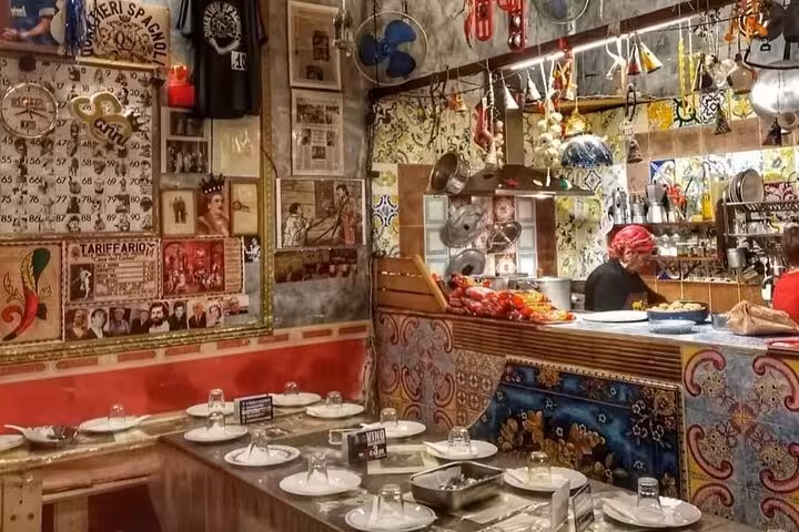 Cozy Italian restaurant in Naples with colorful decor, offering an authentic culinary experience.
