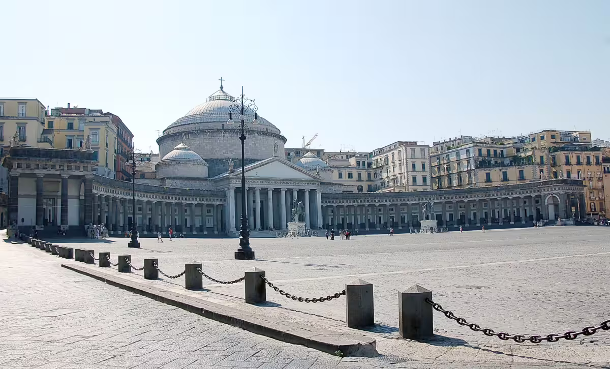 Wide view of Piazza del Plebiscito and Basilica of San Francesco di Paola, a highlight of central Naples walking tours