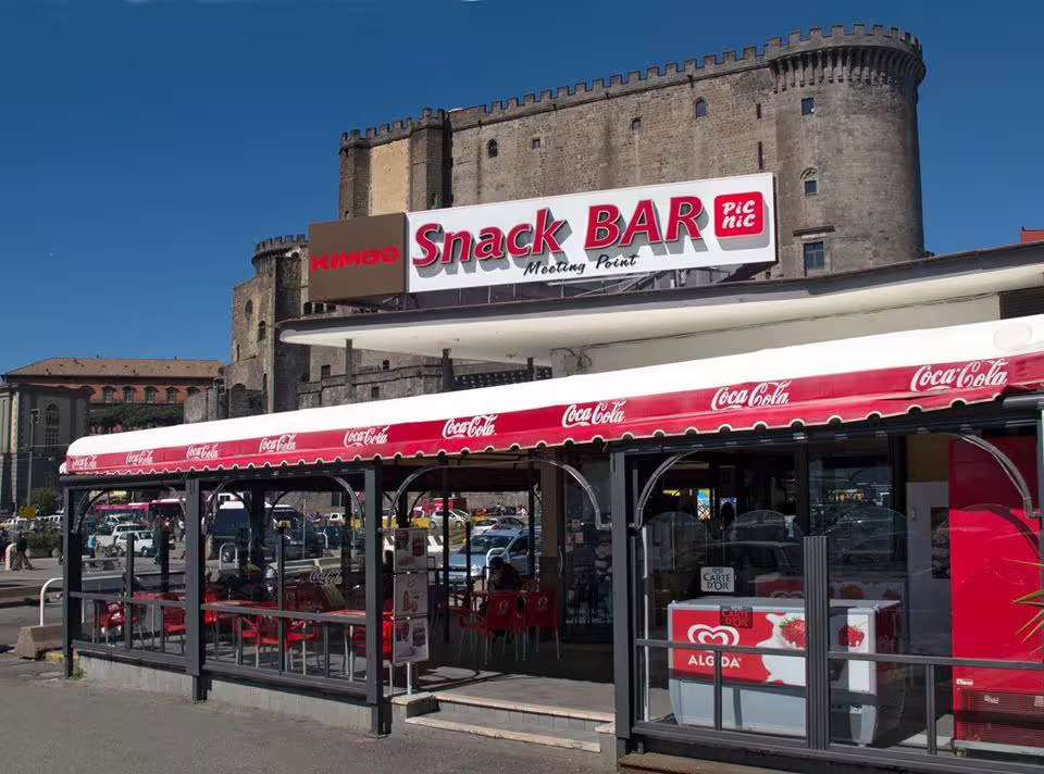 Naples meeting point near Castel Nuovo by Snack Bar, pickup for Pompeii and Naples group tour