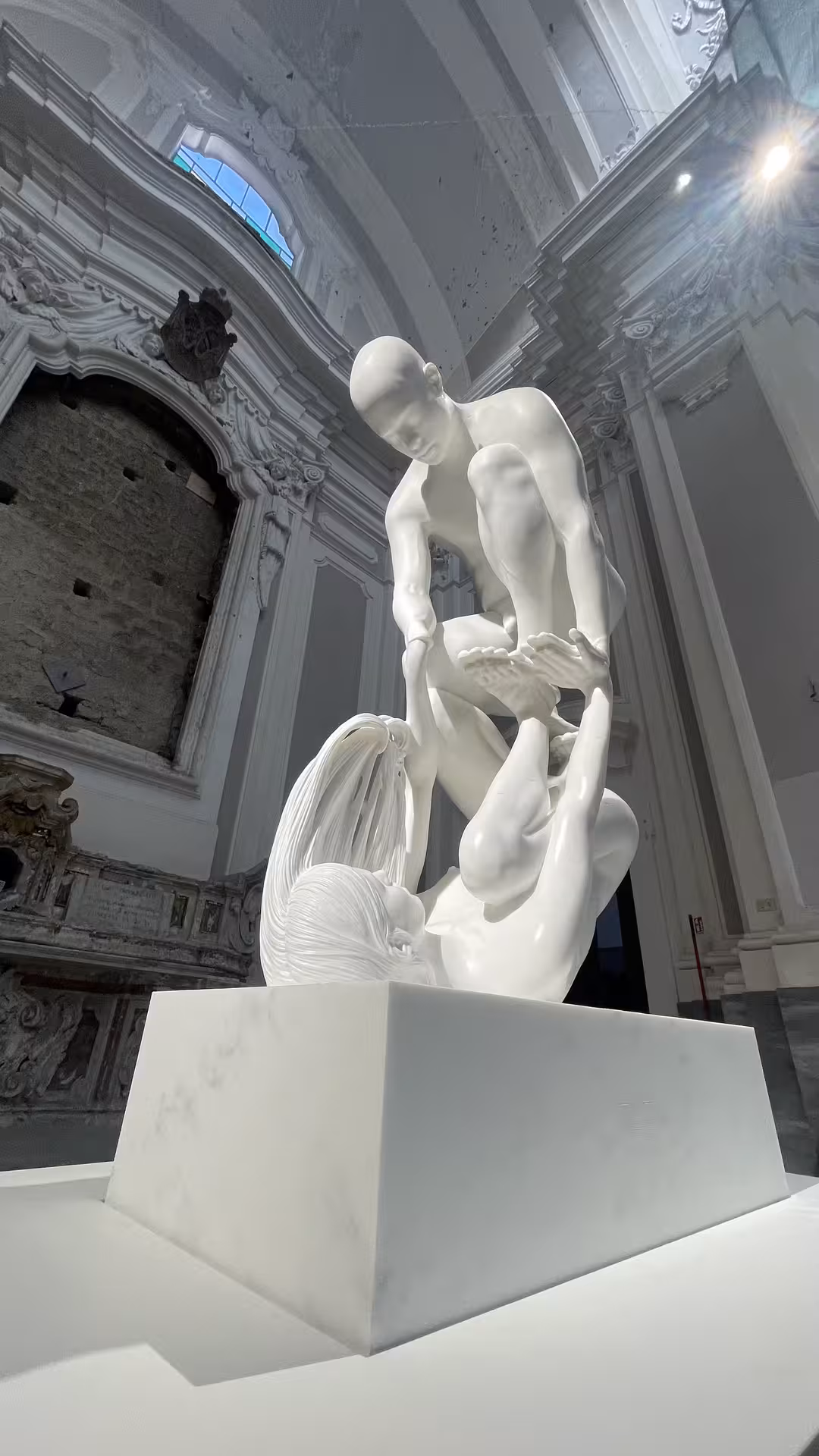 Close-up of a modern sculpture in a grand hall during a Sanità district guided tour in Naples.