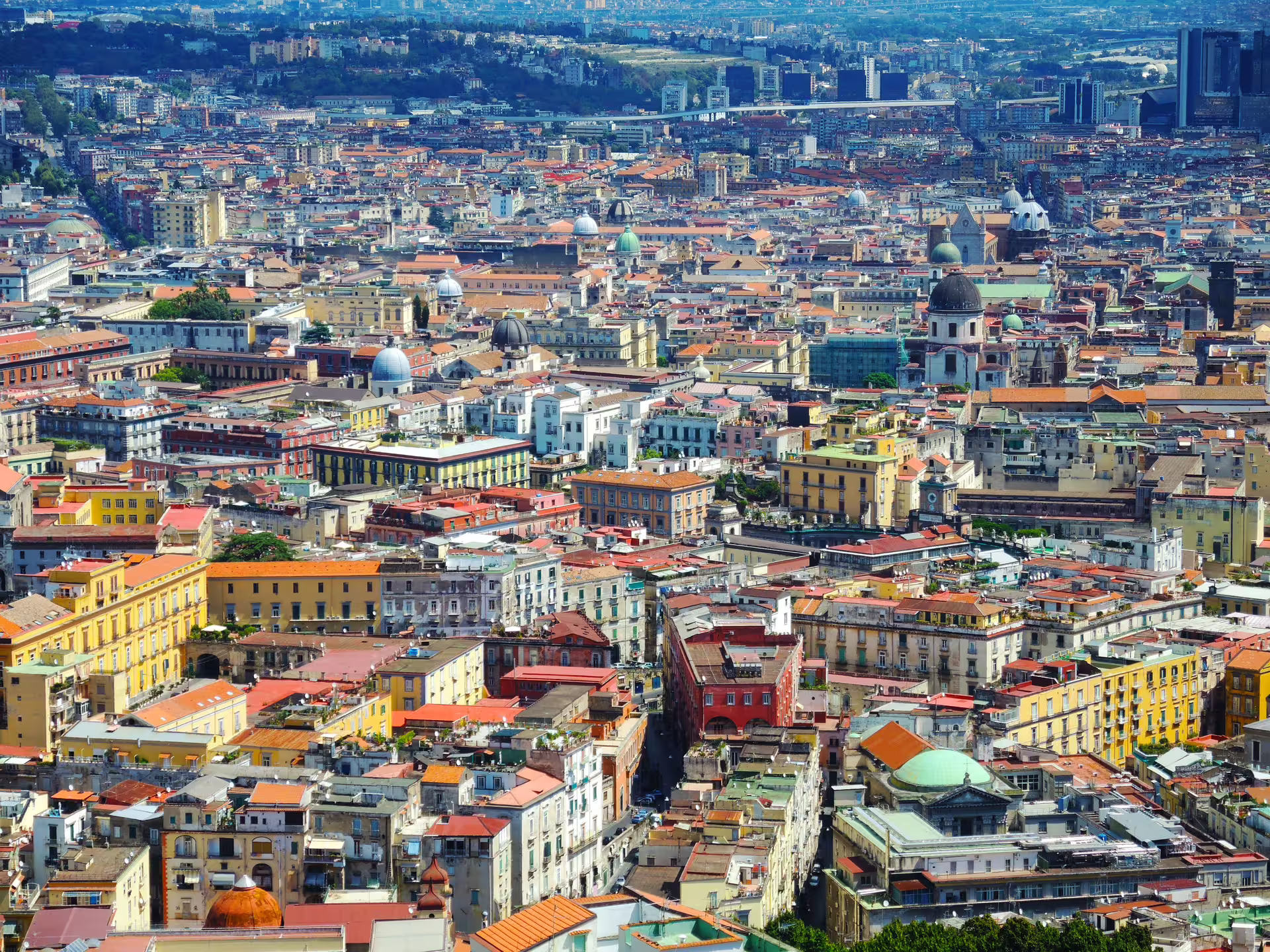 Panoramic view over Naples historic center rooftops, a scenic backdrop for a Naples street food tour