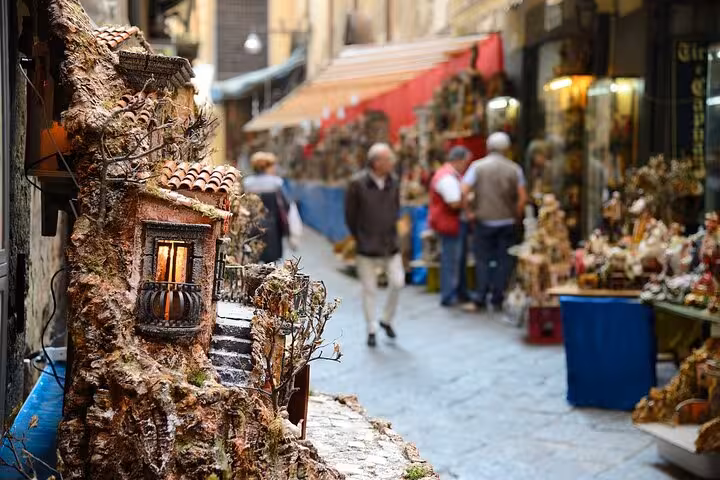 Stroll through Naples' vibrant streets with handcrafted nativity scenes, a cultural highlight of the walking tour.