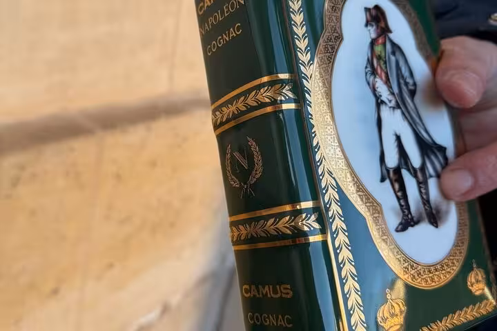 Napoleon-themed Camus cognac bottle featured in Paris food, wine and cheese tasting with odd love story