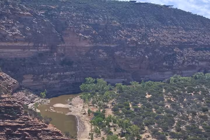 Scenic view of Nature's Window gorge with lush greenery and rugged rock formations in Kalbarri National Park.