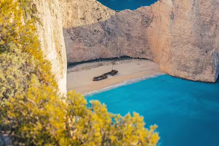 Navagio Shipwreck Beach viewpoint on Zakynthos, turquoise water and cliffs on southern half-day tour
