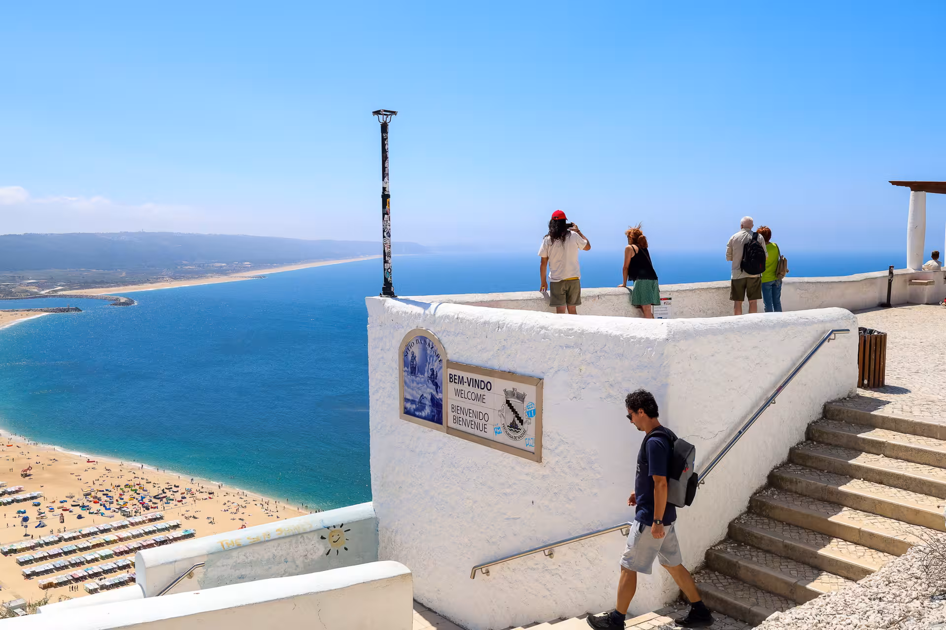 Witness stunning ocean views from the Nazaré cliffs, a highlight on the small group tour from Lisbon.