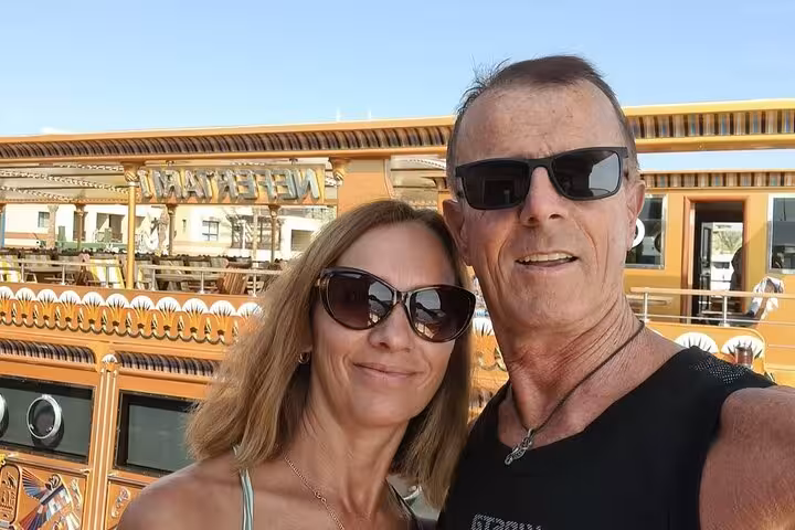 Couple selfie on Nefertari snorkeling cruise from Makadi, Red Sea glass boat tour with pickup in Egypt