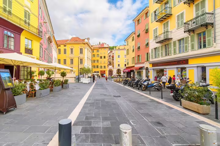 Colorful Old Town street in Nice near Place Massena, seen on a private car tour with local driver guide