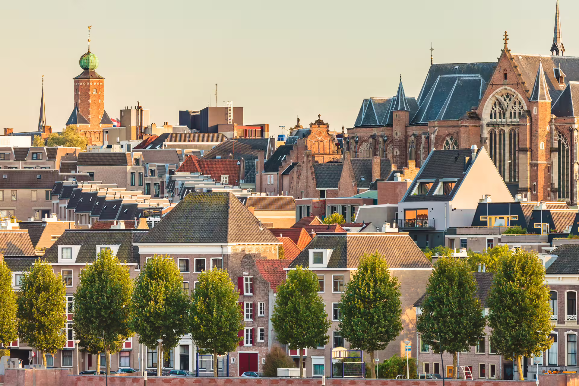 Nijmegen skyline with Stevenskerk and historic rooftops, ideal stop on a 1-day walking tour audioguide