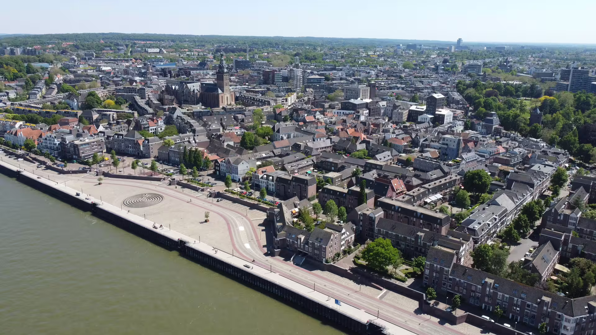 Drone view of Nijmegen Waalkade riverside and historic center on the Waal, self-guided 1-day walking tour