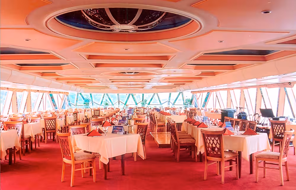 Elegant dining hall set for Nile Crystal Cairo floating dinner cruise on the Nile with transfers included