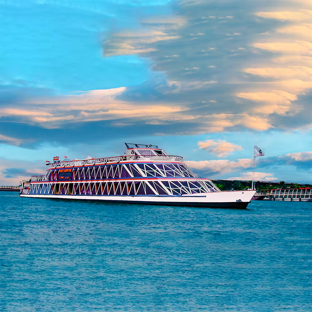 Nile Crystal floating dinner cruise boat sailing on the Nile in Cairo at sunset, ideal for belly dancer show