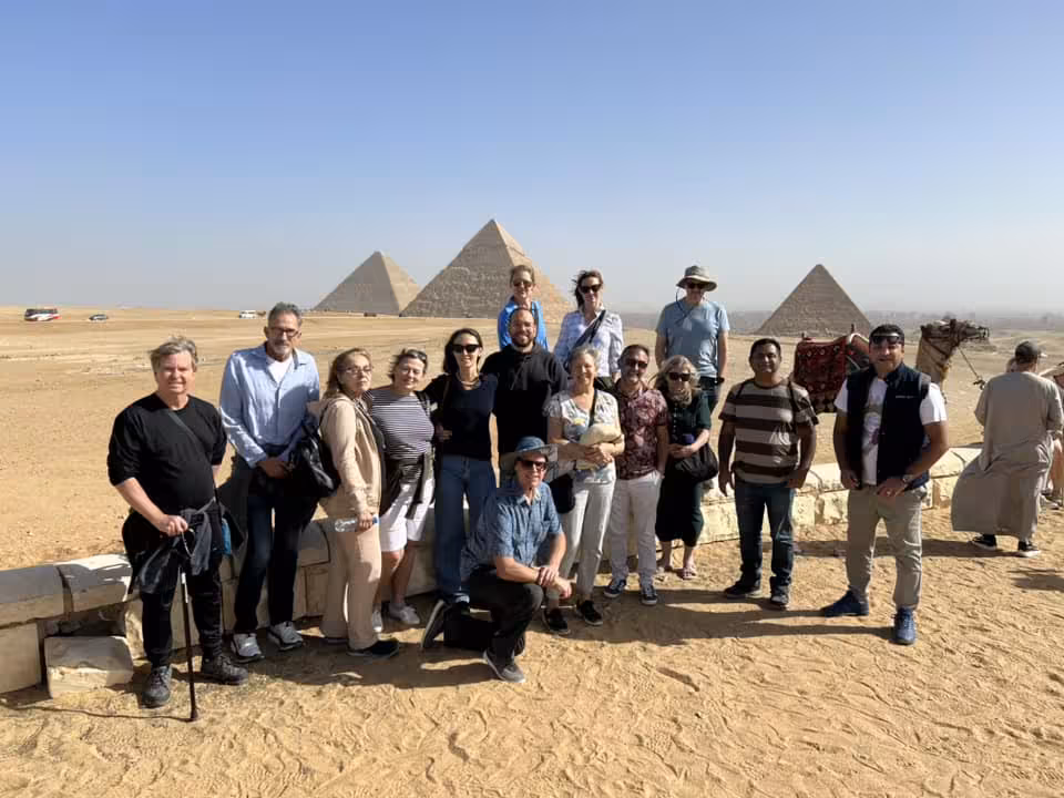 Tour group at the Giza Pyramids viewpoint near Cairo, pre-cruise excursion for the Nile Pearl 5-star Nile cruise