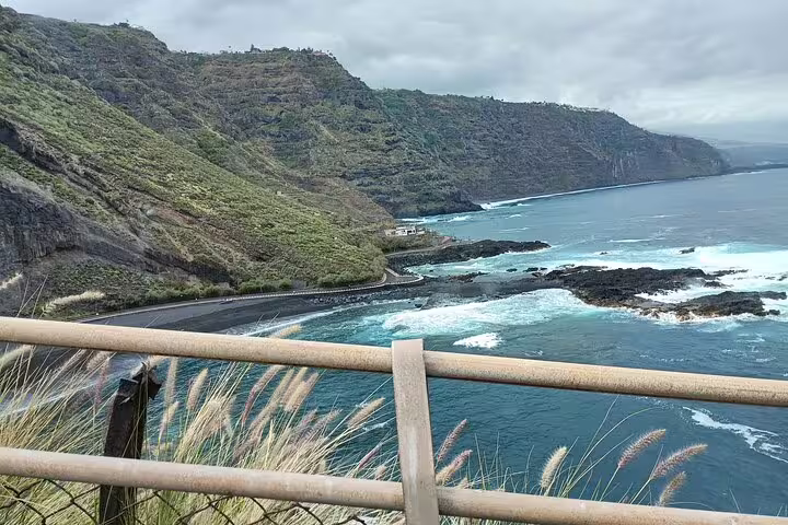 Scenic view of rugged cliffs and the ocean along a coastal road in North Tenerife on a private tour.