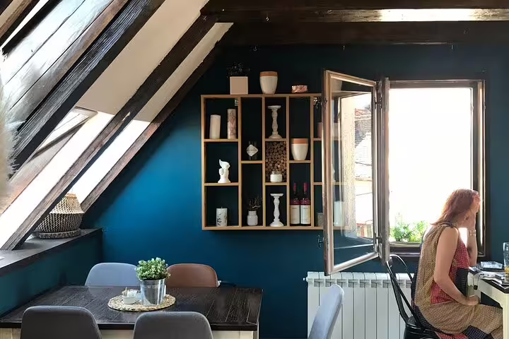 Cozy Novi Sad apartment cafe interior near city sights, perfect stop on private half day Serbia tour