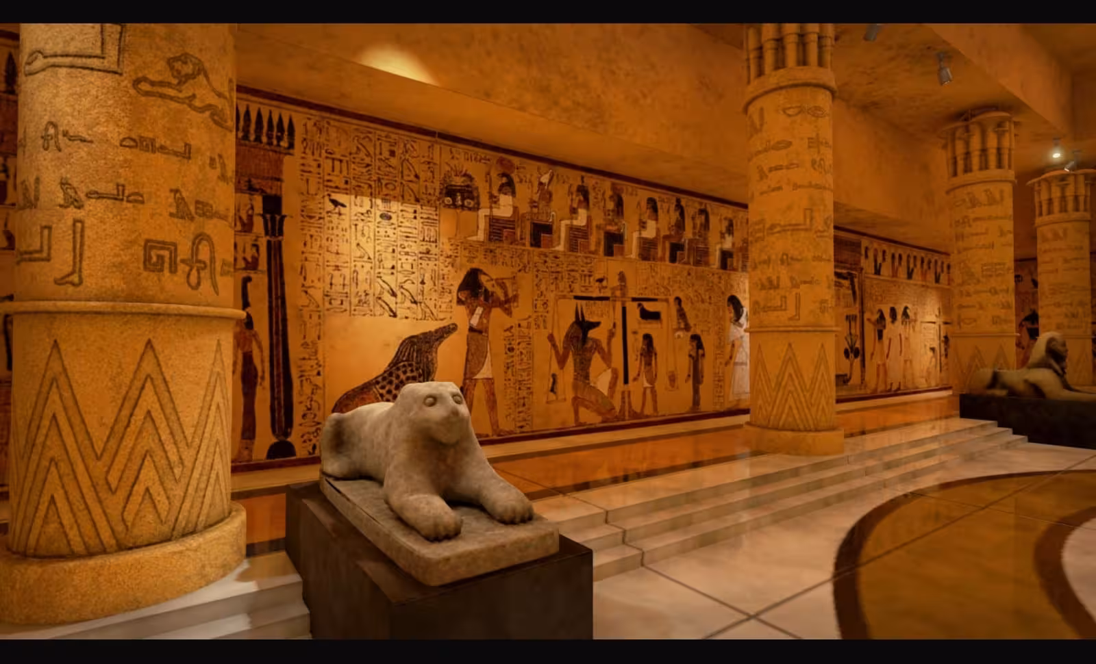 Nubian Museum Aswan hall with hieroglyphic murals, columns and sphinx statue, immersive Aswan museum visit