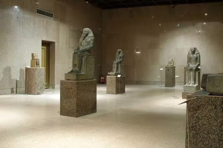 Ancient Egyptian statues inside the Nubian Museum Aswan, featured on Kalabsha Temple and museum tour