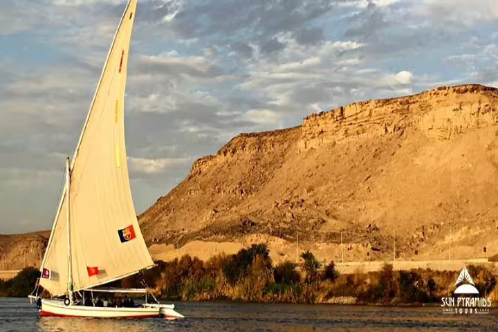 Sailboat on the Nile near Aswan, scenic stop on Nubian Village motorboat private tour with guide and transfer