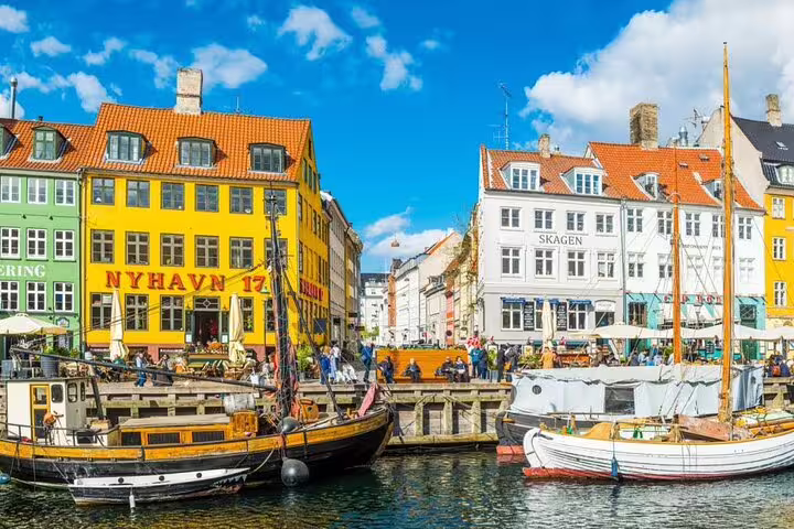 Nyhavn harbor with colorful houses and boats, a key stop on the Copenhagen e-scavenger hunt self-guided tour