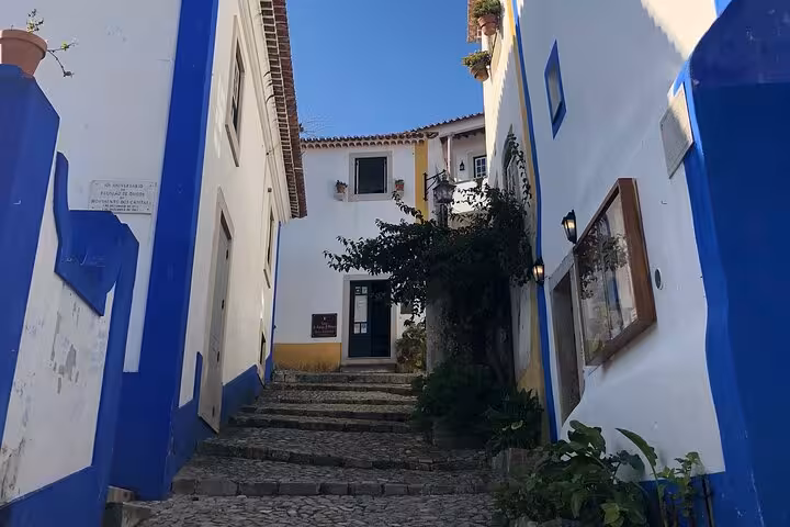 Stroll through the picturesque cobblestone streets of Óbidos on the Lisbon to Óbidos guided tour.