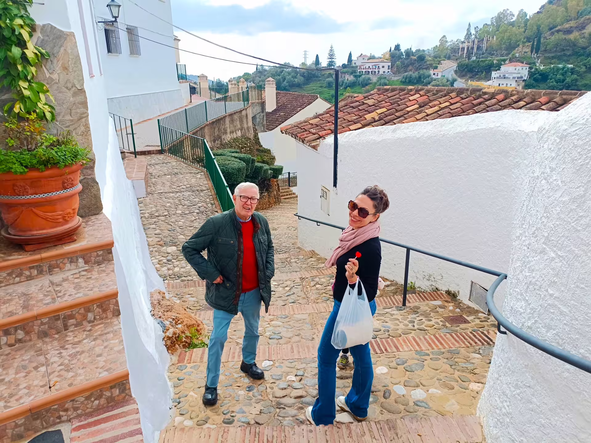 Guests stroll Ojen’s cobbled lanes on a private tour from Costa del Sol, passing whitewashed houses and views