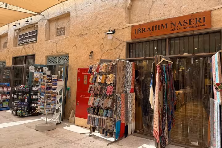 Old Dubai souk souvenir shop in Al Seef, a stop on Dubai city tour with Ain Dubai entrance