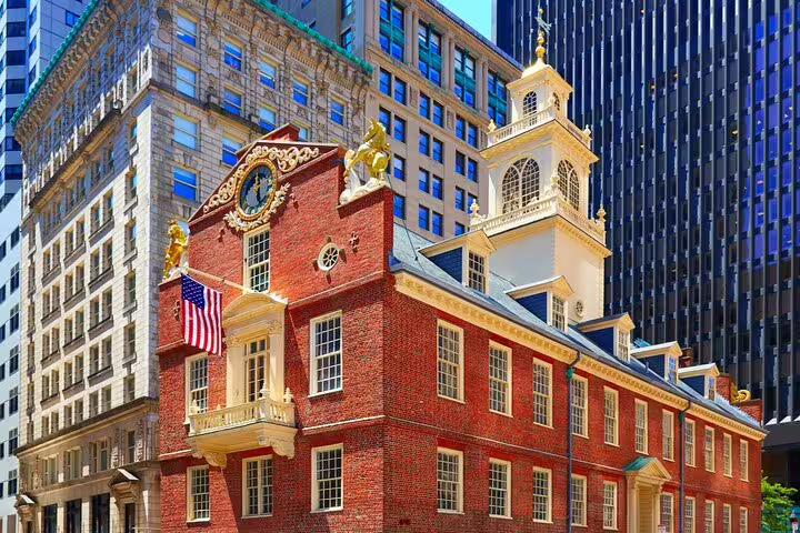 Old State House red brick building with American flag on Boston Freedom Trail