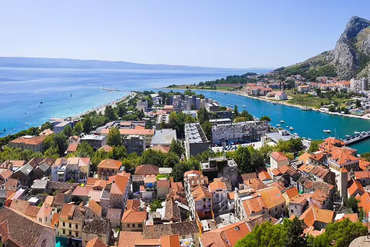 Panoramic Omiš and Cetina River mouth from viewpoint, part of Makarska Riviera boat tour with lunch