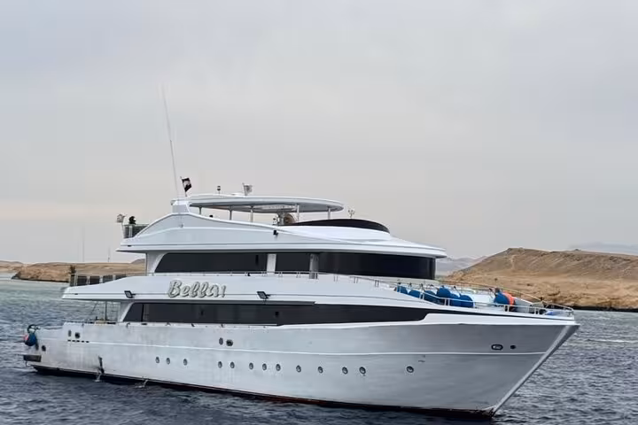 Luxury yacht cruising near Orange Island, Hurghada, for Orange Bay snorkeling trip with lunch on board