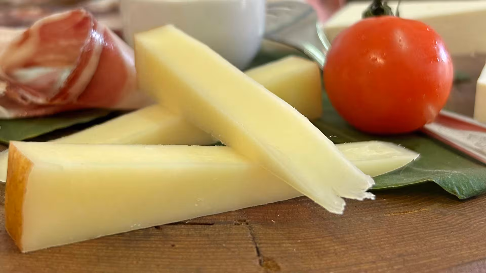 Savor local Oristano flavors with cured meats, cheese, and fresh tomato on a farm tour with olive oil tasting.