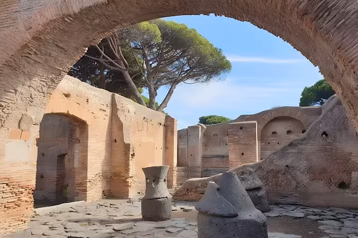 Experience the historic charm of Ostia Antica's arches and stone structures on an exclusive half-day tour.
