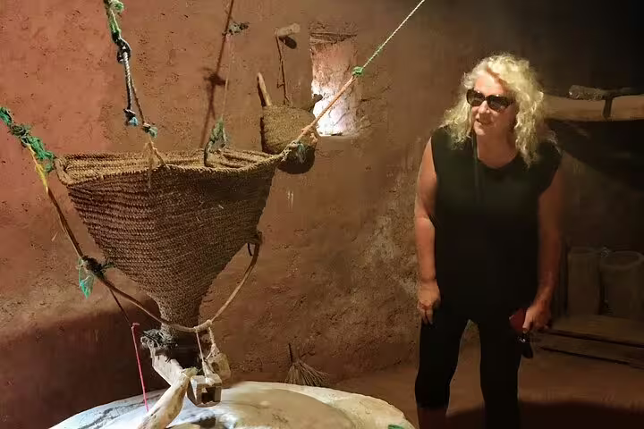 Traveler visiting traditional Berber home on Ourika Valley tour, Morocco cultural experience near Marrakech