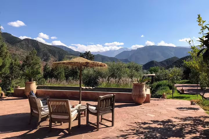 Terrace lounge with Atlas Mountain views on Ourika Valley day tour, Morocco Berber countryside escape