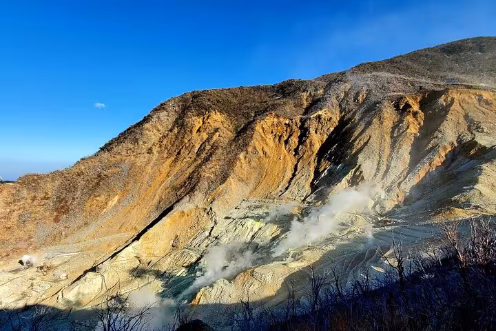 Close-up of Owakudani's rugged terrain and sulfur vents, a must-see on the Tokyo to Hakone tour.