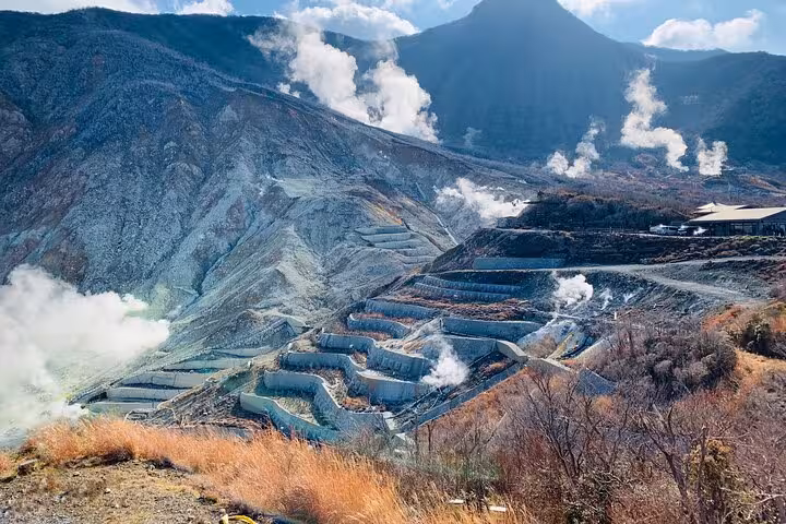 Owakudani Valley's steaming volcanic landscape, a highlight of the English Guided 2 Days Mt. Fuji and Hakone Private Tour.