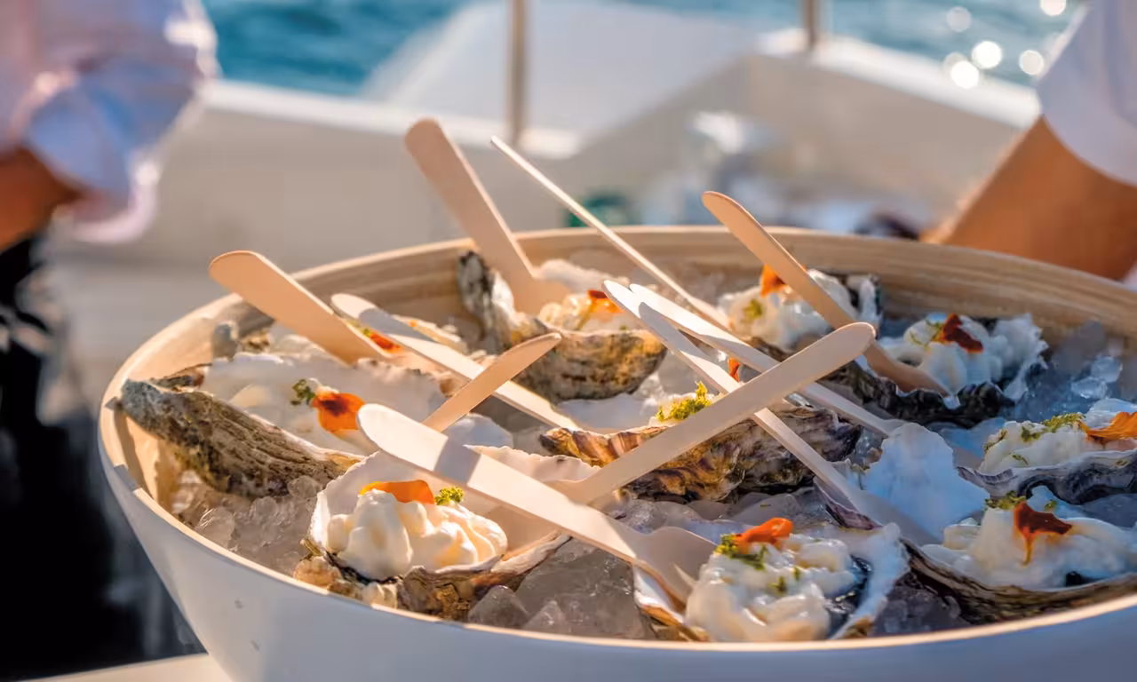 Fresh oysters on ice served aboard a luxury private sunset cruise boat in Albufeira Algarve Portugal