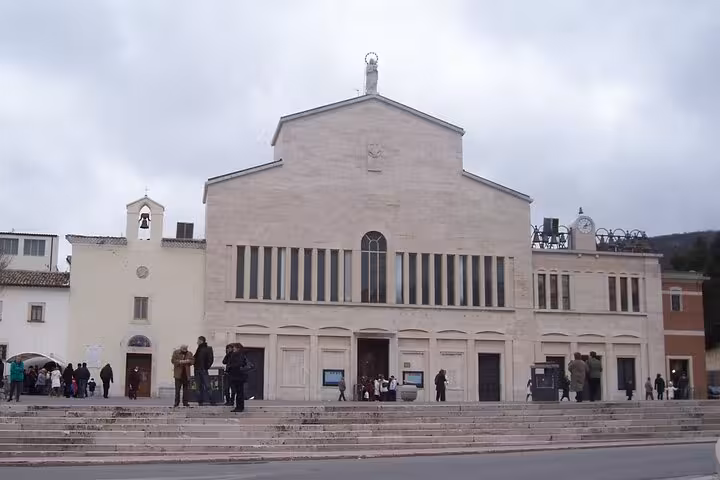 Facade of San Giovanni Rotondo's church, a key stop on the Padre Pio Private Tour from Rome, attracting pilgrims.