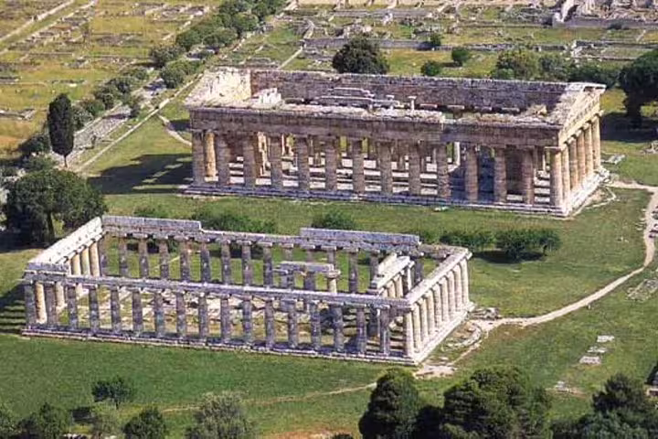 Aerial view of two ancient Doric temples at Paestum, Italy, visited on a guided private tour of the Greek ruins site