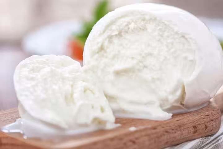 Enjoy fresh buffalo mozzarella during the farm experience on the Paestum Temples tour from Sorrento.