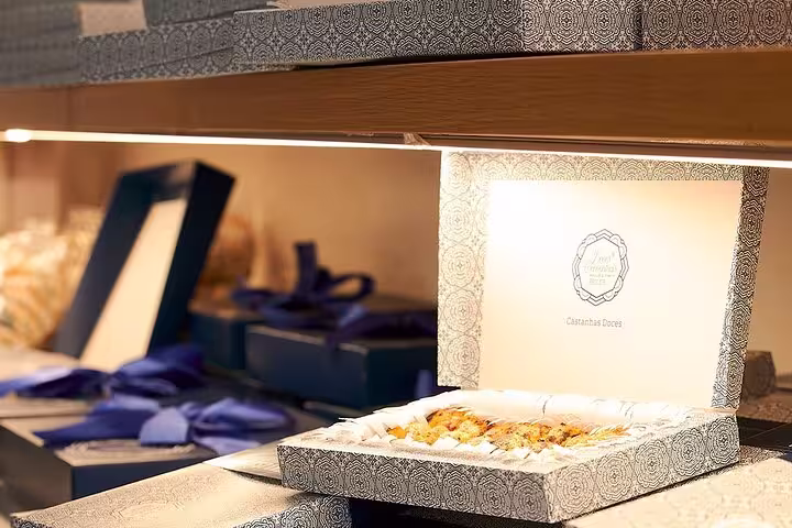 Beautifully arranged gift boxes with intricate designs, perfect for Paiva Walkways tour souvenirs.