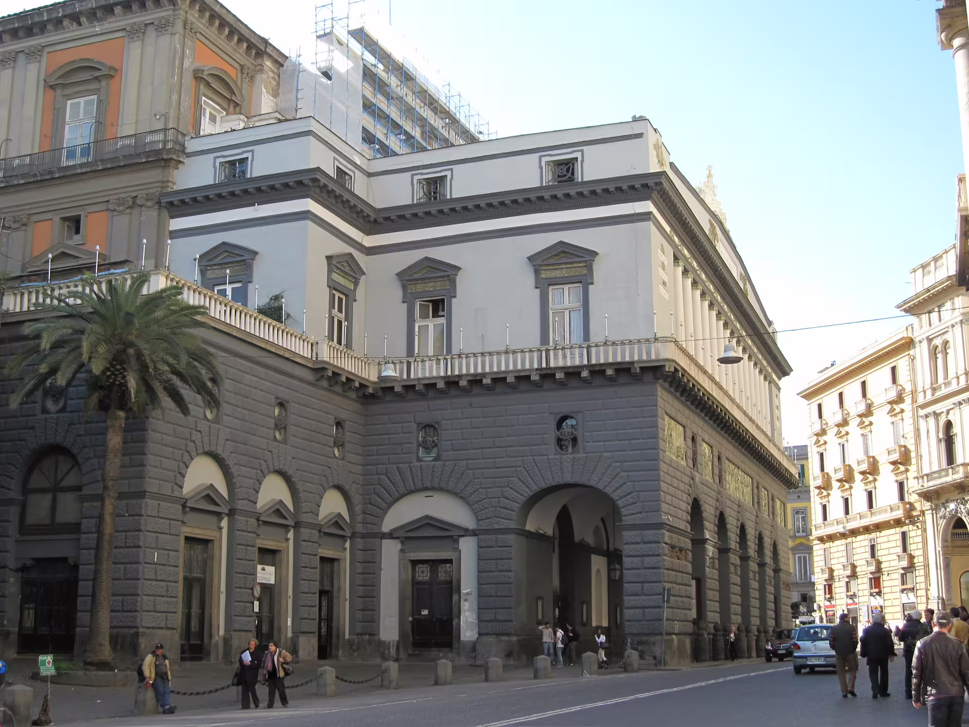Historic Palazzo Reale area in central Naples on daylight city walking tour with scenic Gulf of Naples bus views