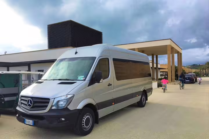 Modern Mercedes minivan used for private transfer service between Palermo Airport PMO and Palazzo Natoli Boutique Hotel