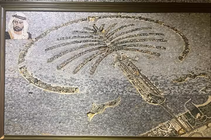 Mosaic map of Palm Jumeirah layout, highlighting fronds and crescent, part of The View entrance tour