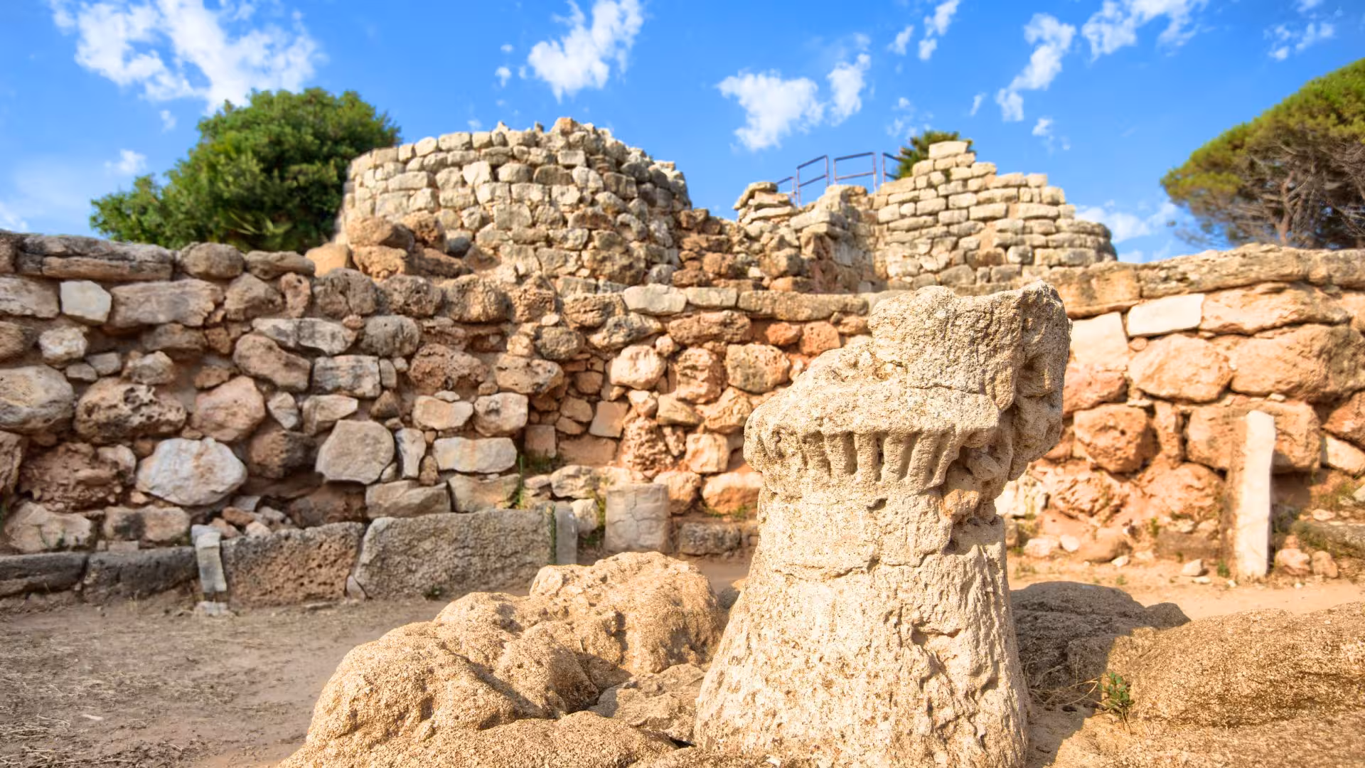 Close-up view of the intricate stonework at Palmavera nuraghe, highlighting the historical architecture in Alghero.