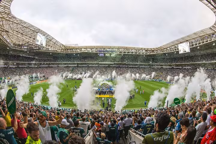 Packed Allianz Parque stadium with smoke show and Palmeiras crowd, São Paulo local matchday experience