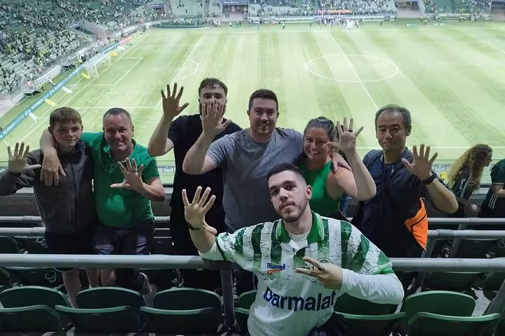Palmeiras fans pose in Allianz Parque stands during São Paulo Palmeiras Game Experience with local host